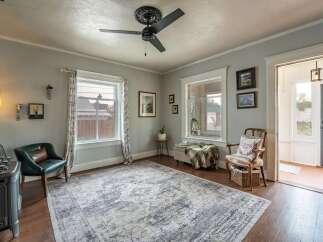 Step into this charming living space, featuring a cozy ambiance and elegant design.