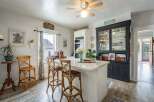 This charming kitchen boasts a bright and airy atmosphere, perfect for culinary adventures.