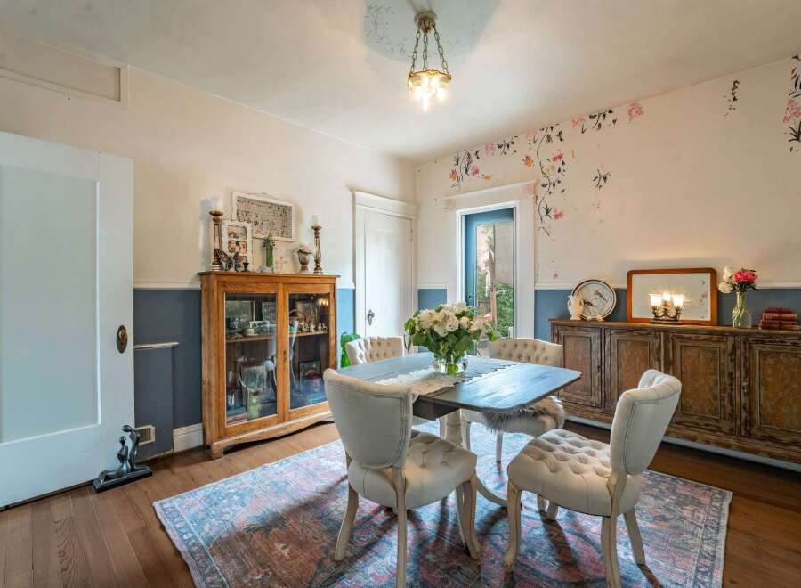 Step into this charming dining room, perfect for hosting intimate gatherings.