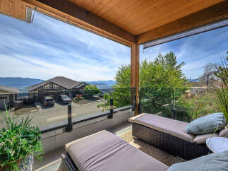 Enjoy breathtaking views from this stunning property, featuring a luxurious outdoor space perfect for relaxation.