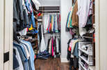Step into organized luxury with this stunning walk-in closet! Featuring ample storage space and stylish design, this closet is perfect for keeping your wardrobe tidy and accessible.