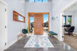 Step into a world of elegance with this stunning entryway.