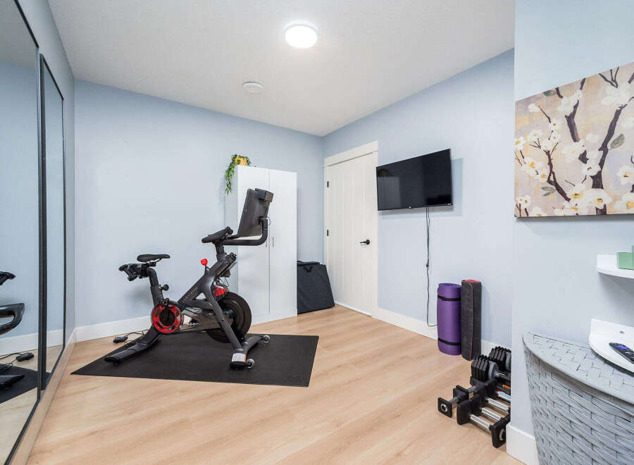 This home gym offers a dedicated space for fitness enthusiasts.