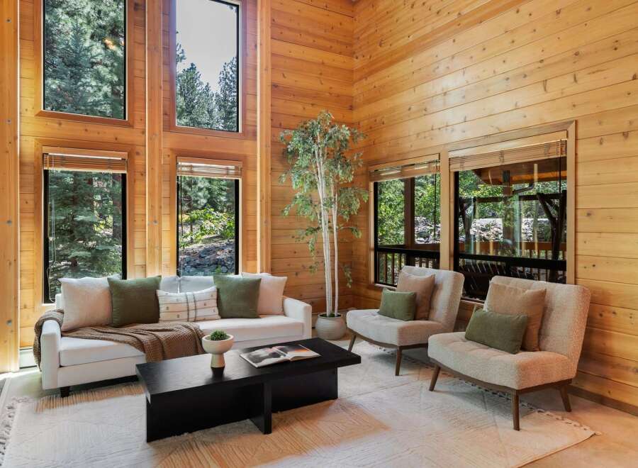 Experience the warmth and charm of this stunning property, featuring exquisite wood paneling throughout.
