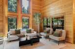 Experience the warmth and charm of this stunning property, featuring exquisite wood paneling throughout.