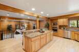 Step into this stunning kitchen with beautiful wood cabinetry and granite countertops.