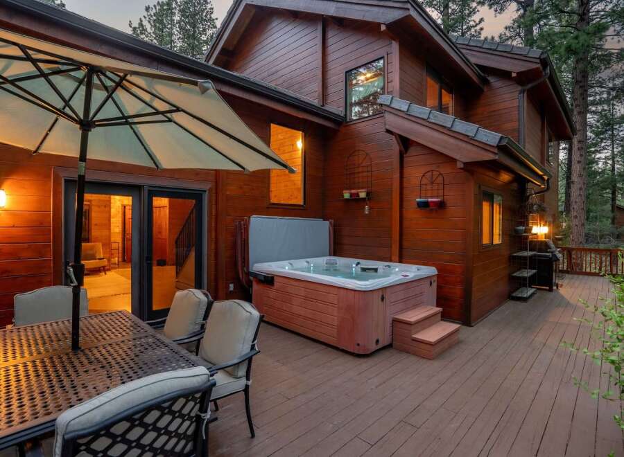 Discover the ultimate relaxation in this stunning home featuring a luxurious hot tub, perfect for unwinding after a long day.