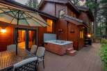 Discover the ultimate relaxation in this stunning home featuring a luxurious hot tub, perfect for unwinding after a long day.