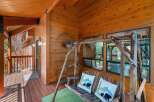 Enjoy the tranquility of this charming cabin with a welcoming porch.