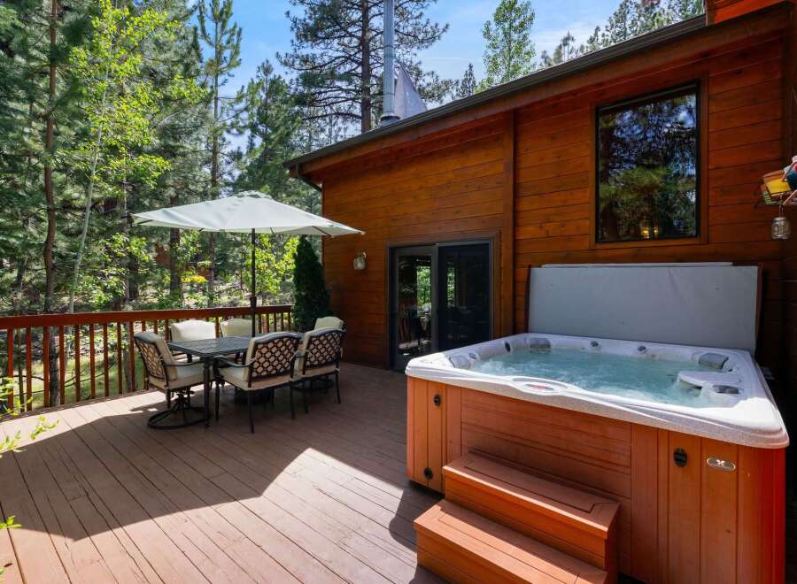 Enjoy the ultimate relaxation in this stunning property featuring a luxurious hot tub.