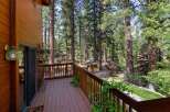 Enjoy the tranquility of nature from this stunning property! This home features a spacious deck, perfect for relaxing and taking in the surrounding forest views.