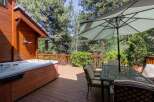 Enjoy the ultimate relaxation in this stunning outdoor oasis! This property features a luxurious hot tub, perfect for unwinding after a long day.