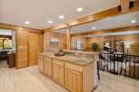 Step into this stunning home featuring a beautifully designed kitchen with custom cabinetry and granite countertops.
