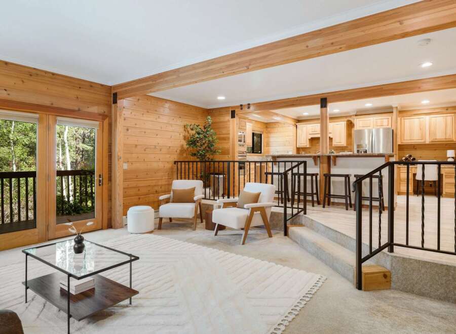 Step into this stunning home featuring a seamless blend of natural wood elements and modern design.