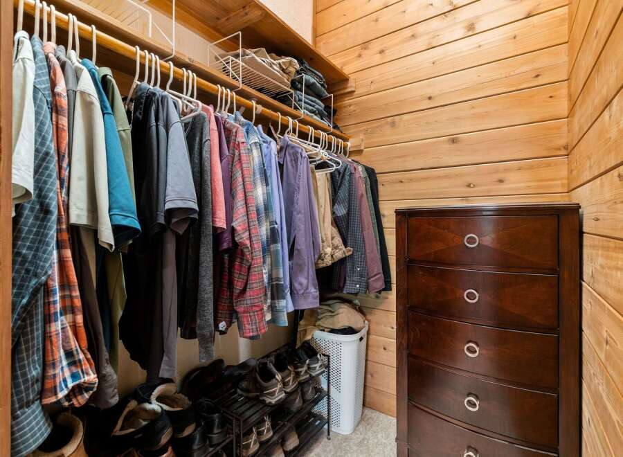 Step into this well-organized closet, a testament to thoughtful design and ample storage.