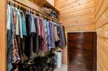 Step into this well-organized closet, a testament to thoughtful design and ample storage.