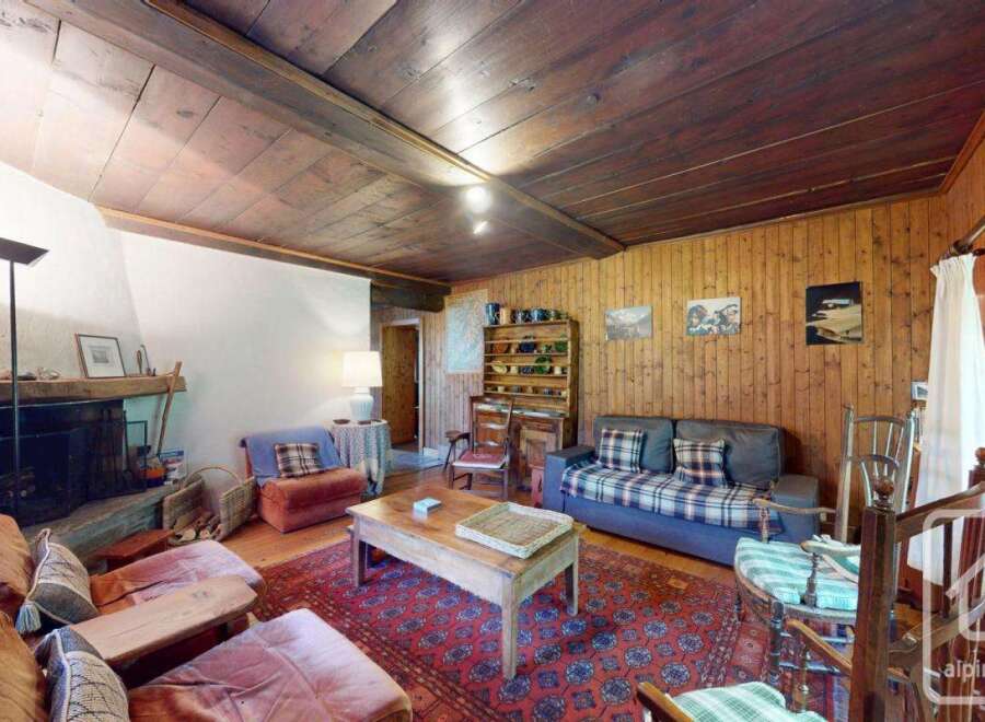 Step into a cozy living space with rustic charm.