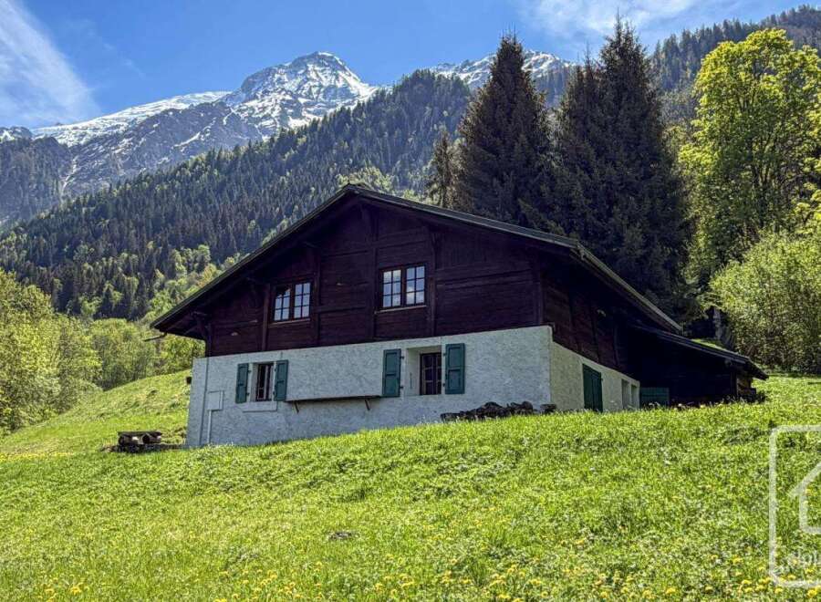 Nestled in a picturesque mountain setting, this charming property offers a tranquil escape.