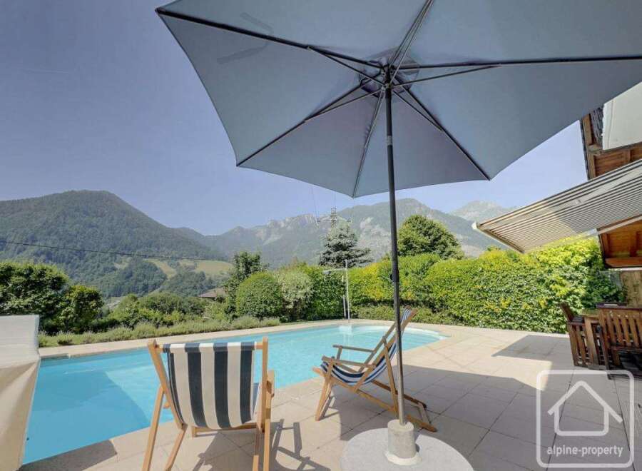 Enjoy the ultimate relaxation in this stunning property featuring a private pool and breathtaking mountain views.