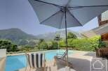 Enjoy the ultimate relaxation in this stunning property featuring a private pool and breathtaking mountain views.