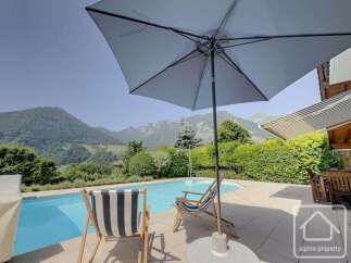 Enjoy the ultimate relaxation in this stunning property featuring a private pool and breathtaking mountain views.