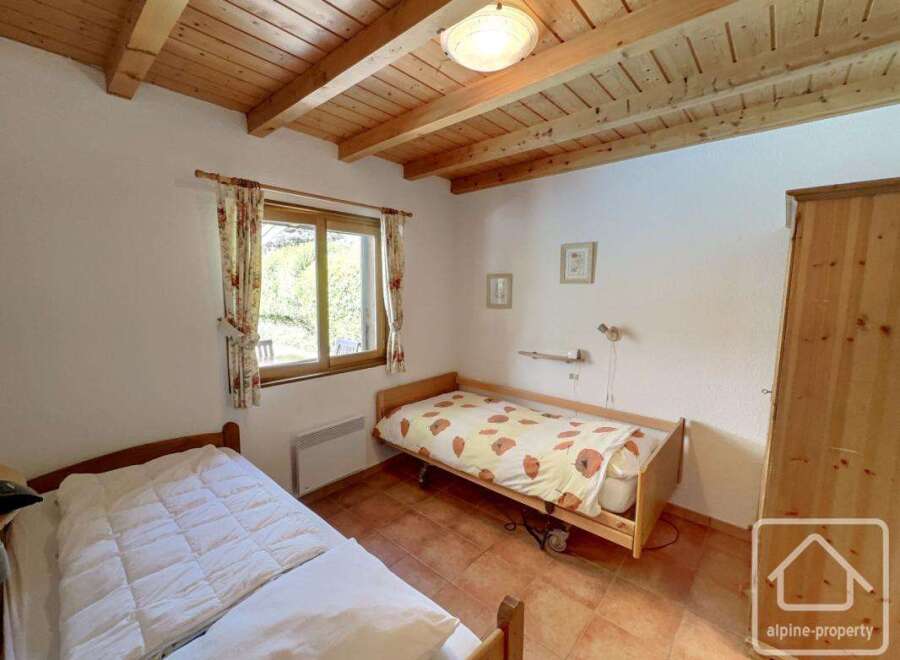 Discover a cozy bedroom with a warm and inviting atmosphere.
