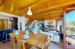 Experience the charm of this stunning property, featuring a warm and inviting wooden ceiling that adds a touch of rustic elegance.