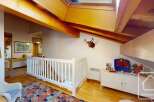 Discover the charm of this unique property, featuring a cozy interior with exposed wooden beams and a stylish design.
