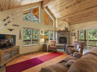 Step into a cozy mountain retreat with this stunning living room.