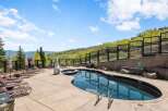 Enjoy the ultimate relaxation at this stunning property featuring a luxurious outdoor pool and hot tub.