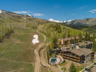 Discover luxury living in this stunning mountain property, offering breathtaking views and unparalleled access to outdoor adventures.