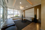 This modern living space offers a comfortable and stylish atmosphere, perfect for relaxation or entertaining.