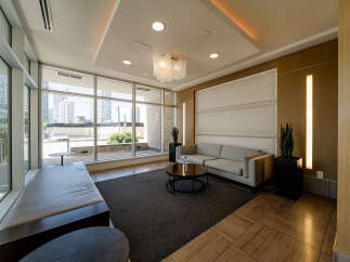 This modern living space offers a comfortable and stylish atmosphere, perfect for relaxation or entertaining.