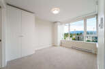Discover this bright and airy bedroom, perfect for modern living.