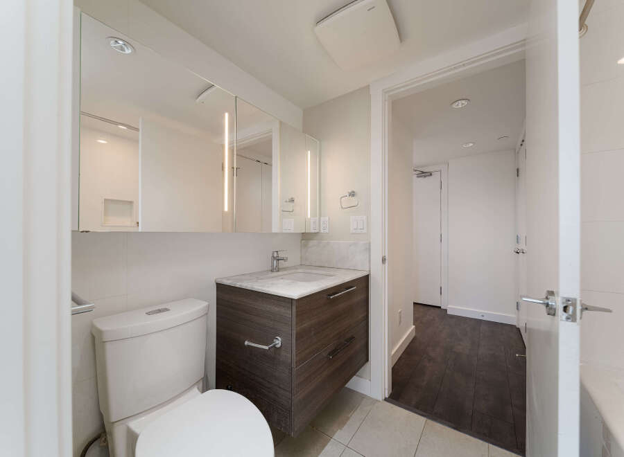Step into a modern bathroom with sleek design elements.