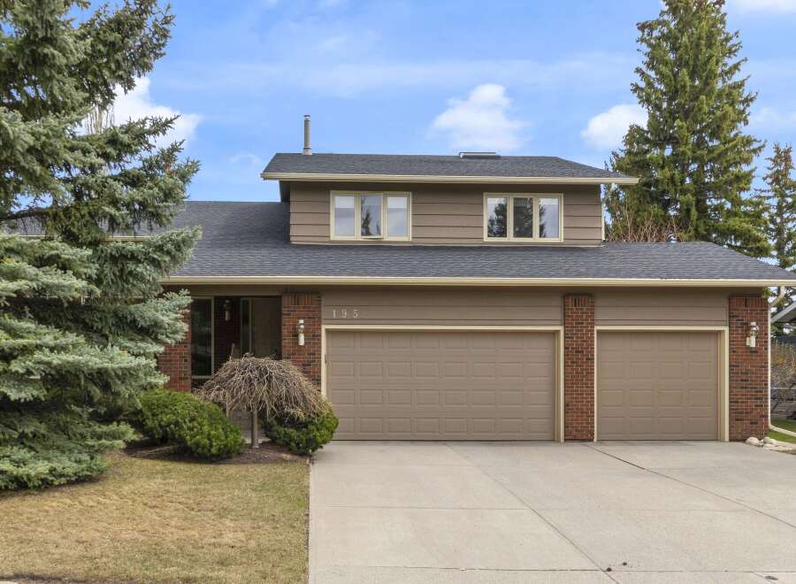 This charming home features a spacious two-car garage and a well-maintained exterior.