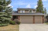 This charming home features a spacious two-car garage and a well-maintained exterior.