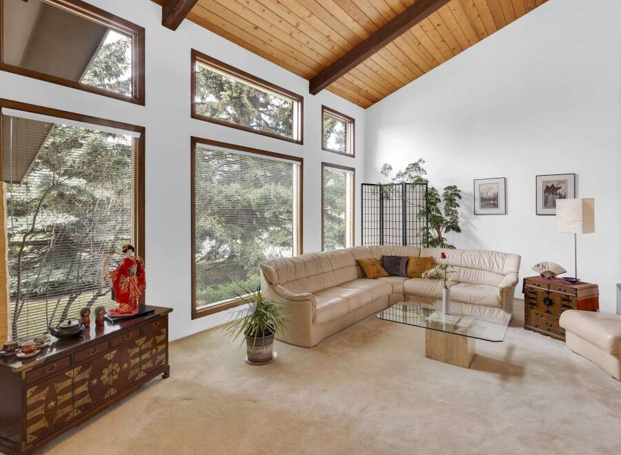 Step into this stunning living room, showcasing a blend of natural light and elegant design.