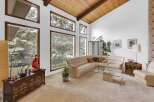 Step into this stunning living room, showcasing a blend of natural light and elegant design.