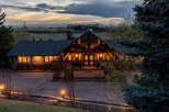 This stunning property boasts a unique architectural design with a blend of natural materials and modern elements.