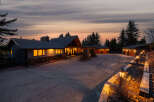 This stunning property boasts a luxurious estate with a grand entrance and ample parking space.