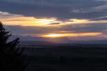 Experience breathtaking sunsets over the majestic mountains from this stunning property.