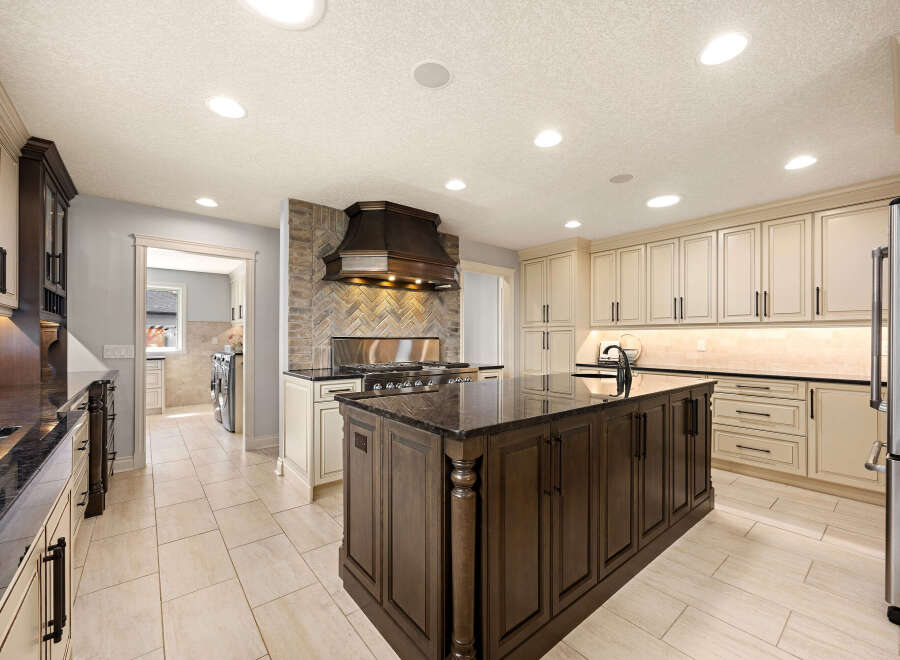 Step into a stunning kitchen with a large island, perfect for culinary creations and entertaining.