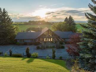 This stunning property boasts a beautiful house with a unique architectural design, perfect for those seeking a luxurious lifestyle.