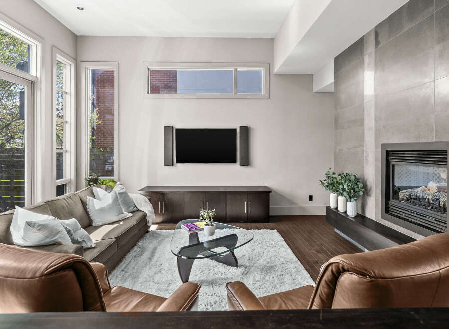Experience modern luxury in this stunning living room.