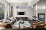 Experience modern luxury in this stunning living room.
