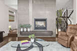 This stunning living room boasts a modern fireplace, perfect for cozy evenings.