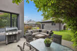 Enjoy outdoor living at its finest in this stunning backyard oasis.