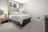 Step into a serene bedroom retreat, designed for comfort and style.