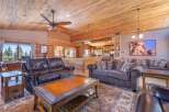 Step into luxury with this stunning property featuring a spacious living area with a cozy fireplace and a gourmet kitchen.